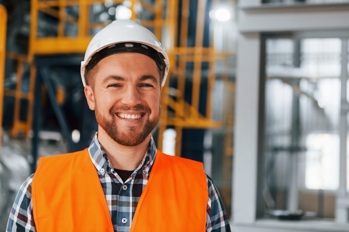 portrait-of-construction-worker-in-uniform-is-in-t-2022-02-03-17-42-07-utc